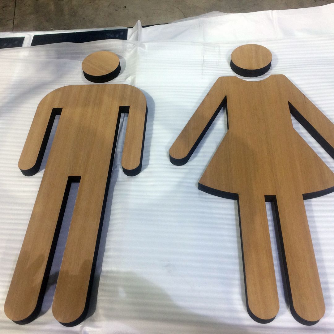 Ladies and Gents bathroom signage - 35mm thick lasercut timber